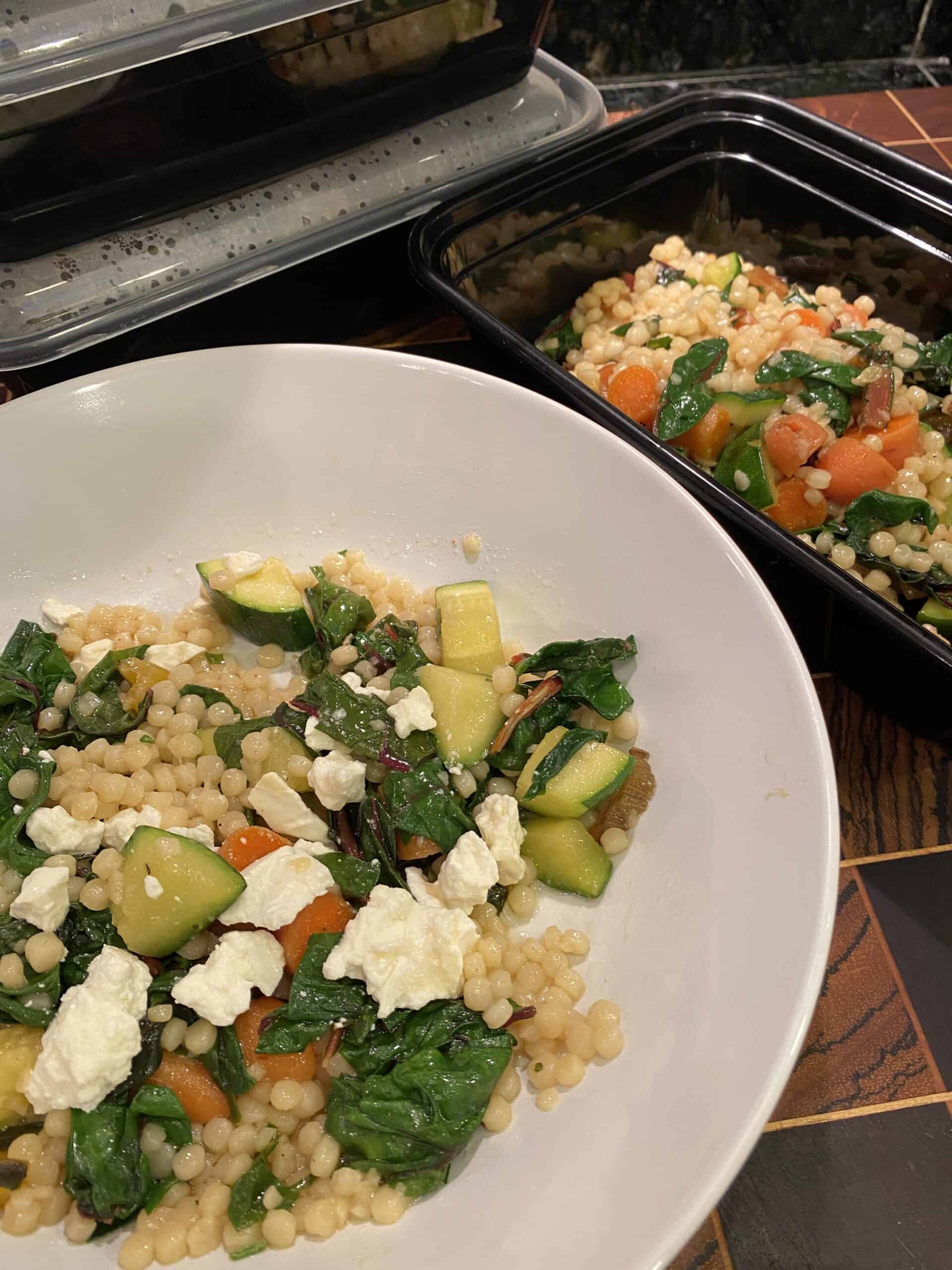 Couscous bowl with meal prep containers