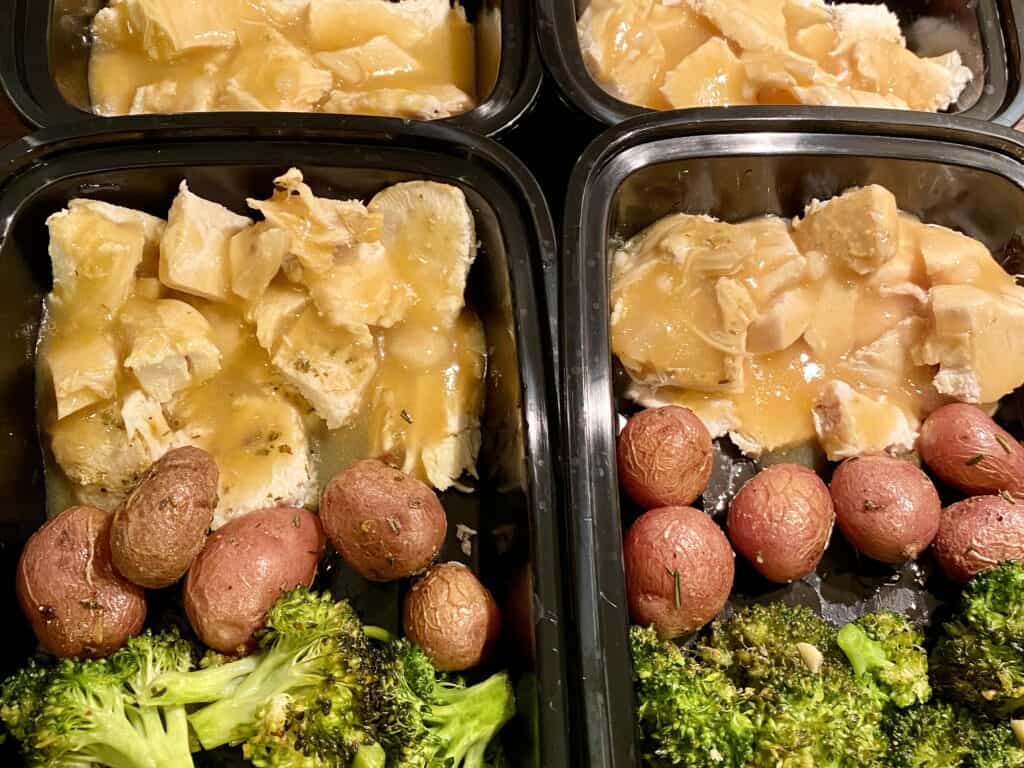 meal prepped turkey dinner with potato and broccoli